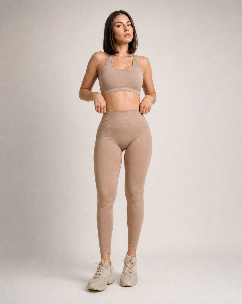 GymApex catalogue model wearing the Elevate Bra and Elevate Leggings, showing where to measure